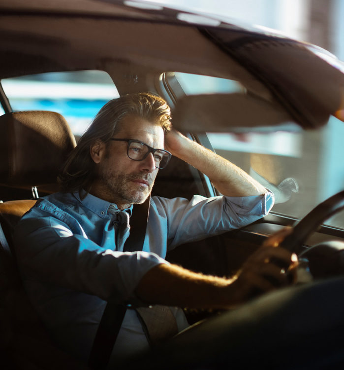 Man driving a car